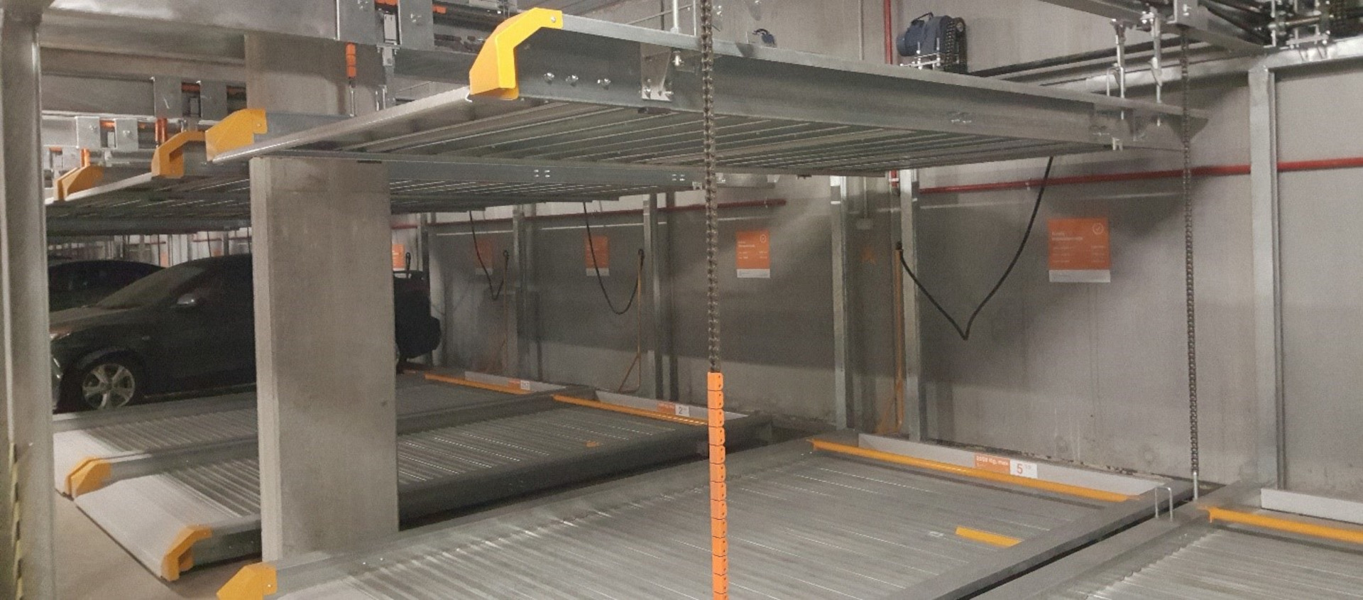 Lift-slide semi-automated parking system